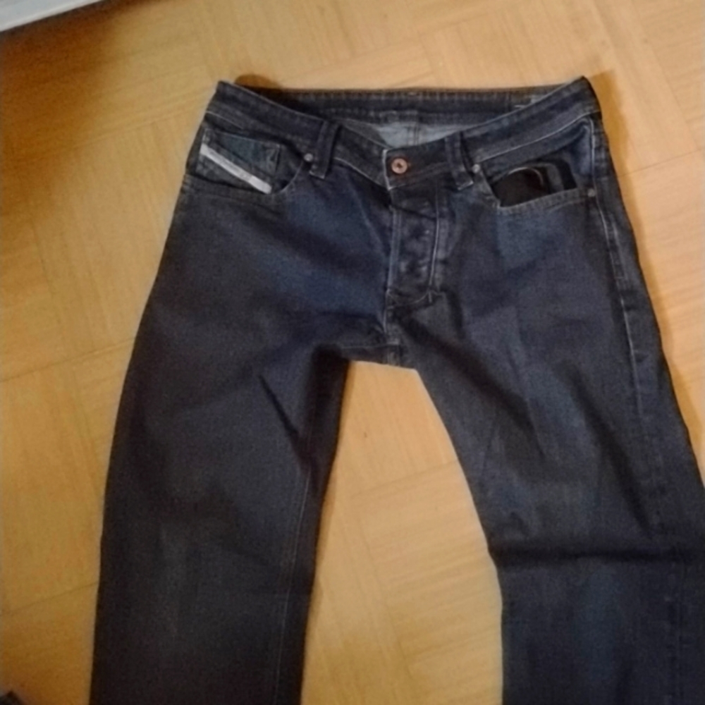 2 pairs of Diesel industry (Blue) jeans.